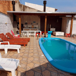 Casa de praia com piscina proximo a praia do Sonho e Pinheira - SC